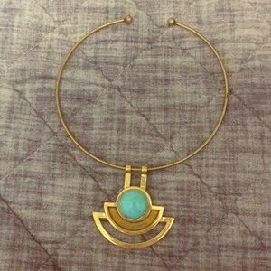 A brass/blue Pamela love sunset choker